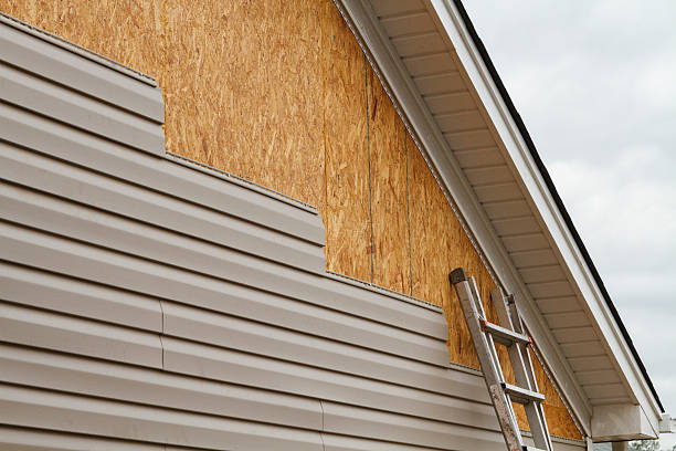 Professional Siding technician working in Spartanburg, SC